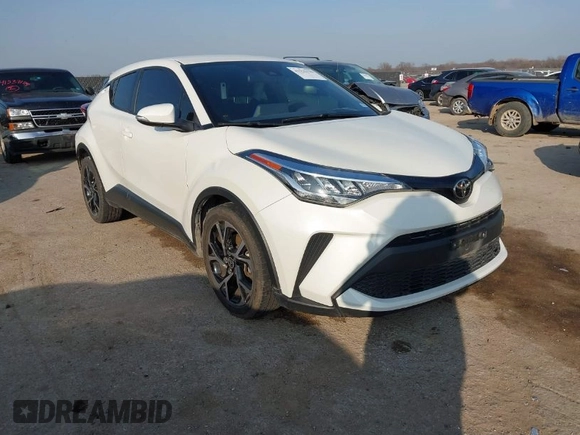 2021 Toyota C-HR LE with VIN JTNKHMBXXM1099019, listed as a IAAI auction lot 41525170 with 63,519 mi miles. Bid and sale history available at carsss.com. Image 1.