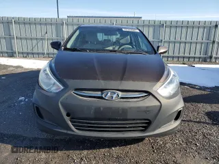 2015 Hyundai Accent GLS with VIN KMHCT4AE8FU815937, listed as a Copart auction lot 52503685 with 136,253 mi miles and Clean Title. Bid and sale history available at carsss.com. Image 5.