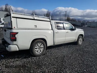 2024 Nissan Frontier SV with VIN 1N6ED1FJXRN637443, listed as a Copart auction lot 49068835 with 6,600 mi miles and Salvage title. Bid and sale history available at DreamBid. Image 3.