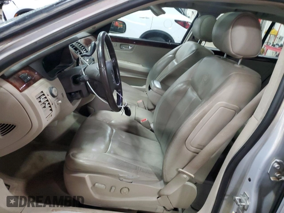 2007 Cadillac DTS Luxury I with VIN 1G6KD57Y47U141388, listed as a Copart auction lot 52374295 with 198,951 mi miles and Salvage Title. Bid and sale history available at DreamBid. Image 7.