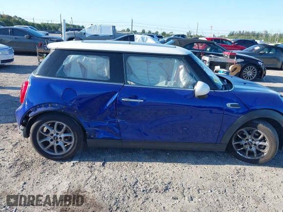2019 MINI Hardtop Cooper with VIN WMWXP5C52K2H97728, listed as a IAAI auction lot 42026666 with 61,464 mi miles and . Bid and sale history available at DreamBid. Image 6.