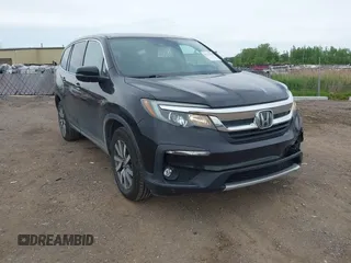 2020 Honda Pilot EX-L with VIN 5FNYF6H51LB058628, listed as a IAAI auction lot 42325435 with 51,877 mi miles and . Bid and sale history available at DreamBid. Image 1.