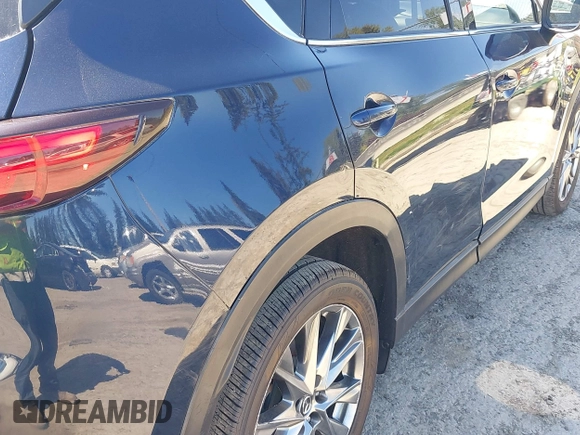 2019 Mazda CX-5 Signature with VIN JM3KFBEY7K0589236, listed as a IAAI auction lot 42078418 with 86,959 mi miles. Bid and sale history available at carsss.com. Image 6.