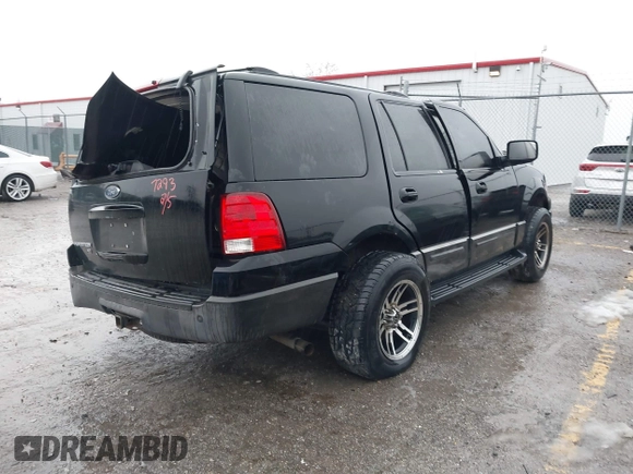 2003 Ford Expedition Special Service with VIN 1FMFU15L43LC27293, listed as a IAAI auction lot 41447025 with 250,000 mi miles. Bid and sale history available at carsss.com. Image 4.