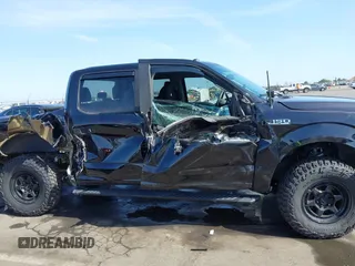 2019 Ford F-150 XL with VIN 1FTEW1EP3KFC71554, listed as a IAAI auction lot 42275266 with 57,065 mi miles and . Bid and sale history available at DreamBid. Image 14.