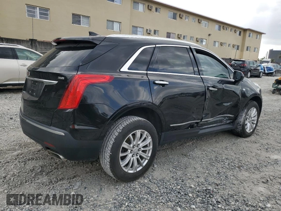 2019 Cadillac XT5 FWD with VIN 1GYKNARS4KZ113480, listed as a Copart auction lot 50328075 with 73,064 mi miles and Non Repairable. Bid and sale history available at carsss.com. Image 3.