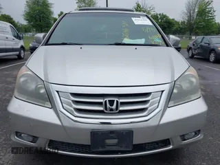2009 Honda Odyssey Touring with VIN 5FNRL38859B029714, listed as a IAAI auction lot 42266381 with 196,747 mi miles and . Bid and sale history available at DreamBid. Image 6.