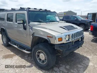 2003 Hummer H2 with VIN 5GRGN23U23H148326, listed as a IAAI auction lot 42068326 with 149,396 mi miles. Bid and sale history available at carsss.com. Image 1.