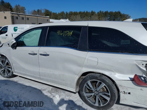 2023 Honda Odyssey Touring with VIN 5FNRL6H81PB008129, listed as a IAAI auction lot 41610714 with 57,273 mi miles and . Bid and sale history available at DreamBid. Image 14.