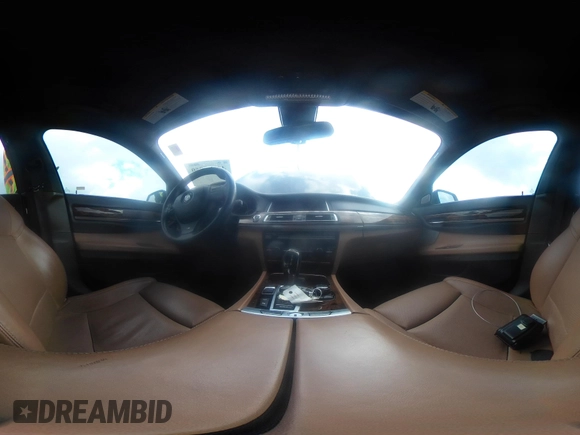 2013 BMW 7 Series 750Li with VIN WBAYE8C55DD133178, listed as a IAAI auction lot 41509860 with 90,841 mi miles and . Bid and sale history available at DreamBid. Image 18.