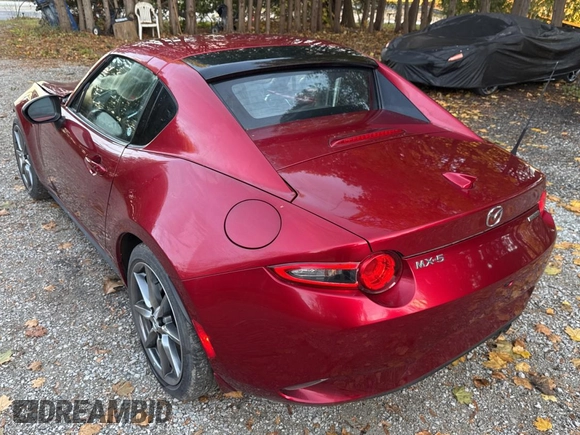2021 Mazda MX-5 Miata Grand Touring z VIN JM1NDAM74M0461263, wystawiony jako Copart lot #81410634 z przebiegiem 44 551 mil mil oraz Szkoda całkowita • Salvage title. Historia ofert i sprzedaży dostępna na DreamBid. Obrazek 3.