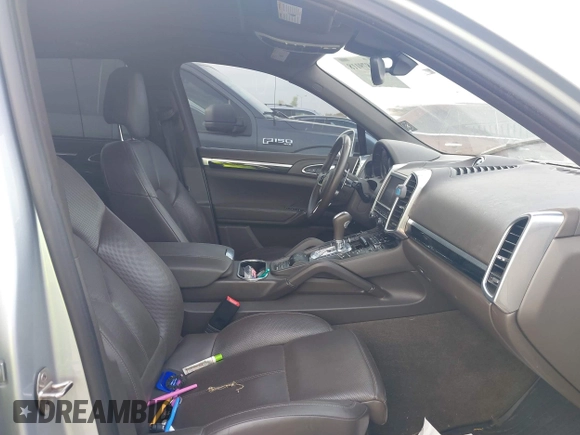 2016 Porsche Cayenne S E-Hybrid with VIN WP1AE2A26GLA59496, listed as a IAAI auction lot 41884022 with 85,386 mi miles and . Bid and sale history available at DreamBid. Image 5.