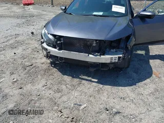 2019 Honda Civic Sport with VIN 2HGFC2F85KH576547, listed as a IAAI auction lot 42024497 with 86,468 mi miles and . Bid and sale history available at DreamBid. Image 6.