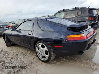 1993 Porsche 928 z VIN WP0AA2929PS815135, wystawiony jako Copart lot #75042334 z przebiegiem Nie podano mil oraz Szkody całkowita. Historia ofert i sprzedaży dostępna na DreamBid. Obrazek 2.