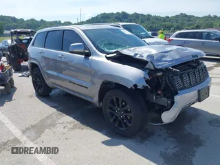 2018 Jeep Grand Cherokee Altitude with VIN 1C4RJFAG8JC466259, listed as a IAAI auction lot 42557612 with 101,663 mi miles and . Bid and sale history available at DreamBid. Image 1.