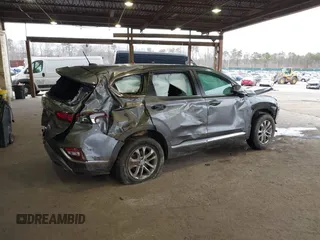 2019 Hyundai Santa Fe SE with VIN 5NMS2CAD7KH094144, listed as a IAAI auction lot 41984633 with 46,307 mi miles and . Bid and sale history available at DreamBid. Image 4.