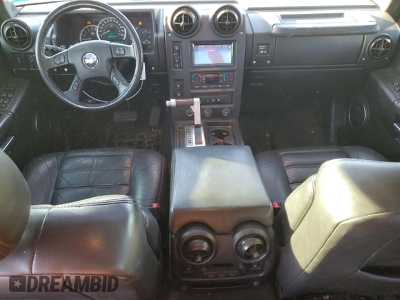 2005 Hummer H2 SUT z VIN 5GRGN22U85H109003, wystawiony jako Copart lot #76557734 z przebiegiem 115 249 mil mil oraz Szkoda całkowita • Salvage title. Historia ofert i sprzedaży dostępna na DreamBid. Obrazek 8.