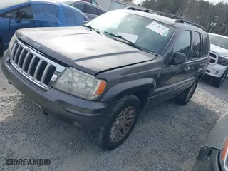 2004 Jeep Grand Cherokee Limited with VIN 1J8GW58N14C391912, listed as a IAAI auction lot 41706729 with 248,806 mi miles. Bid and sale history available at carsss.com. Image 2.