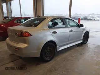 2010 Mitsubishi Lancer DE with VIN JA32U1FU3AU019390, listed as a IAAI auction lot 39876469 with 188,617 mi miles. Bid and sale history available at carsss.com. Image 4.