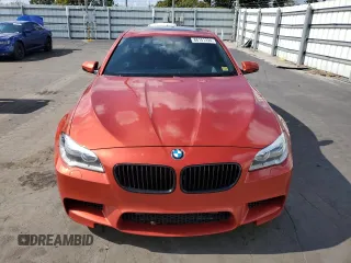 2014 BMW M5 z VIN WBSFV9C58ED097898, wystawiony jako Copart lot #86151234 z przebiegiem 60 470 mil mil oraz Tytuł czysty. Historia ofert i sprzedaży dostępna na DreamBid. Obrazek 5.