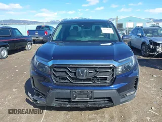 2022 Honda Ridgeline RTL-E with VIN 5FPYK3F71NB013522, listed as a IAAI auction lot 41670347 with 24,689 mi miles and . Bid and sale history available at DreamBid. Image 12.