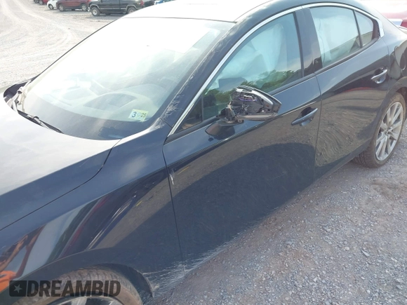 2021 Mazda 3 Premium z VIN 3MZBPADL2MM254467, wystawiony jako IAAI lot #42151557 z przebiegiem 63 282 mil mil oraz . Historia ofert i sprzedaży dostępna na DreamBid. Obrazek 6.