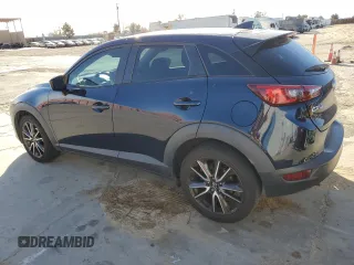 2017 Mazda CX-3 Touring z VIN JM1DKDC74H0165654, wystawiony jako Copart lot #41928295 z przebiegiem 173 567 mil mil oraz Szkoda całkowita • Salvage title. Historia ofert i sprzedaży dostępna na DreamBid. Obrazek 2.