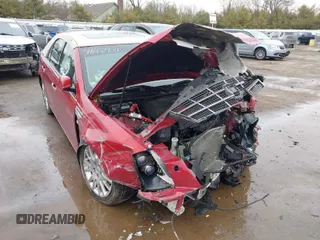 2011 Cadillac STS RWD w/1SB with VIN 1G6DW6ED4B0128004, listed as a IAAI auction lot 41664631 with 546,850 mi miles. Bid and sale history available at carsss.com. Image 1.