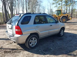 2005 Kia Sportage LX with VIN KNDJF723057130569, listed as a IAAI auction lot 41509247 with 155,777 mi miles and . Bid and sale history available at carsss.com. Image 4.