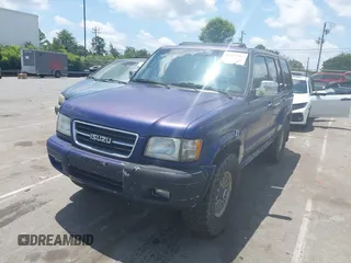 1998 Isuzu Trooper S with VIN JACDJ58X7W7914970, listed as a IAAI auction lot 42527384 with 178,470 mi miles and . Bid and sale history available at DreamBid. Image 2.