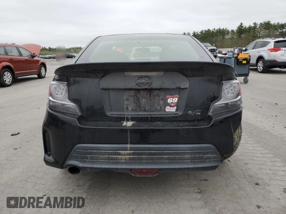 2014 Scion tC z VIN JTKJF5C72E3066945, wystawiony jako Copart lot #56125905 z przebiegiem Nie podano mil oraz Szkoda całkowita • Salvage title. Historia ofert i sprzedaży dostępna na DreamBid. Obrazek 6.