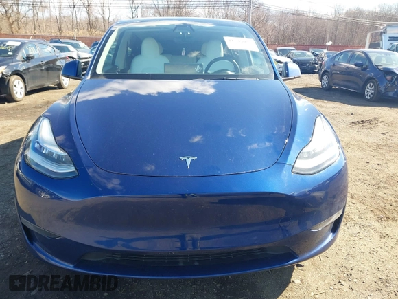 2021 Tesla Model Y Long Range with VIN 5YJYGDEE8MF293230, listed as a IAAI auction lot 41744033 with 56,797 mi miles and . Bid and sale history available at DreamBid. Image 12.