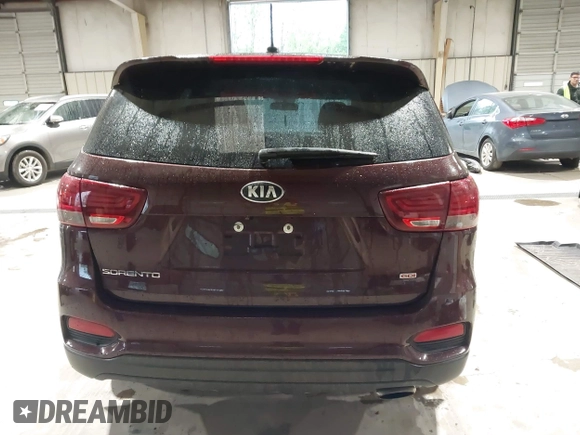 2019 Kia Sorento L with VIN 5XYPG4A34KG548624, listed as a IAAI auction lot 42020831 with 124,226 mi miles. Bid and sale history available at carsss.com. Image 16.