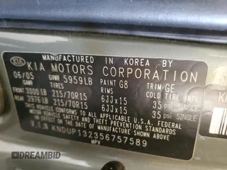 2005 Kia Sedona LX with VIN KNDUP132356757589, listed as a Copart auction lot 51958775 with 71,564 mi miles and Salvage Title. Bid and sale history available at carsss.com. Image 13.
