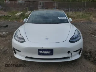 2018 Tesla Model 3 Long Range Battery with VIN 5YJ3E1EAXJF165000, listed as a Copart auction lot 53806195 with 140,448 mi miles and Clean Title. Bid and sale history available at DreamBid. Image 5.