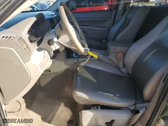 2007 Jeep Grand Cherokee Laredo with VIN 1J8HS48P77C699358, listed as a Copart auction lot 85737474 with 212,591 mi miles and Clean Title. Bid and sale history available at carsss.com. Image 7.