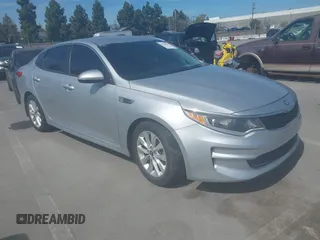 2018 Kia Optima LX with VIN 5XXGT4L31JG267716, listed as a IAAI auction lot 41890611 with 63,491 mi miles and . Bid and sale history available at carsss.com. Image 1.