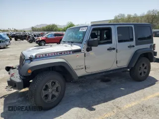 2018 Jeep Wrangler Unlimited Rubicon Recon z VIN 1C4BJWFG3JL847026, wystawiony jako Copart lot #56694415 z przebiegiem 51 279 mil mil oraz Szkoda całkowita • Salvage title. Historia ofert i sprzedaży dostępna na DreamBid. Obrazek 1.