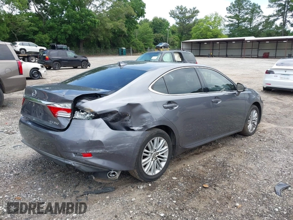 2014 Lexus ES 330 z VIN JTHBK1GG4E2129607, wystawiony jako IAAI lot #42468963 z przebiegiem 115 158 mil mil oraz . Historia ofert i sprzedaży dostępna na DreamBid. Obrazek 4.