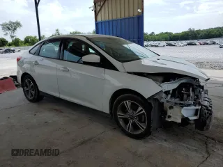 2018 Ford Focus SE с VIN 1FADP3FE5JL329350, выставлен на аукционе Copart как лот 57339055 с пробегом 61 391 миль миль и Списание • Salvage title. История ставок и продаж доступна на DreamBid. Изображение 4.
