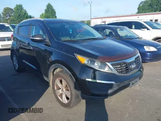 2013 Kia Sportage LX z VIN KNDPB3A21D7393000, wystawiony jako IAAI lot #42551666 z przebiegiem 170 299 mil mil oraz . Historia ofert i sprzedaży dostępna na DreamBid. Obrazek 1.