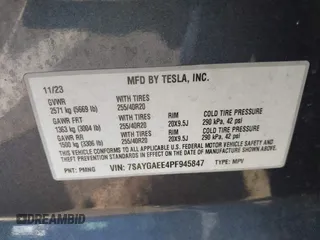 2023 Tesla Model Y Long Range z VIN 7SAYGAEE4PF945847, wystawiony jako IAAI lot #41071924 z przebiegiem 33 454 mil mil oraz . Historia ofert i sprzedaży dostępna na DreamBid. Obrazek 9.