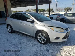 2013 Ford Focus SE with VIN 1FADP3F25DL212152, listed as a Copart auction lot 83640484 with 180,314 mi miles and Clean title. Bid and sale history available at DreamBid. Image 4.