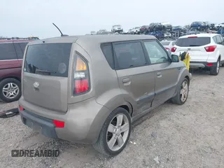 2010 Kia Soul + with VIN KNDJT2A22A7045182, listed as a IAAI auction lot 41322297 with 178,817 mi miles. Bid and sale history available at carsss.com. Image 4.