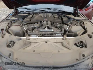 2021 BMW M8 z VIN WBSGV0C03MCF60039, wystawiony jako Copart lot #39737763 z przebiegiem Nie podano mil oraz . Historia ofert i sprzedaży dostępna na DreamBid. Obrazek 11.