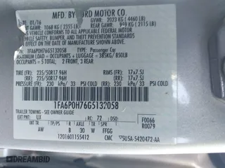 2016 Ford Fusion SE with VIN 1FA6P0H76G5132058, listed as a IAAI auction lot 42033056 with 220,841 mi miles. Bid and sale history available at carsss.com. Image 9.