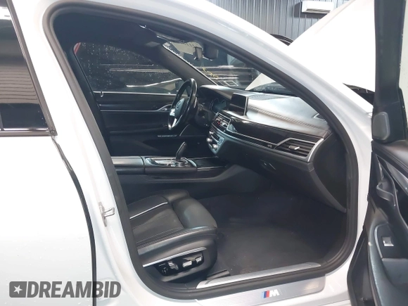 2016 BMW 7 Series 750i xDrive with VIN WBA7F2C59GG419656, listed as a IAAI auction lot 42118092 with 108,560 mi miles and . Bid and sale history available at DreamBid. Image 5.