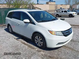 2014 Honda Odyssey EX-L z VIN 5FNRL5H6XEB128646, wystawiony jako IAAI lot #41999997 z przebiegiem 198 972 mil mil oraz . Historia ofert i sprzedaży dostępna na DreamBid. Obrazek 1.