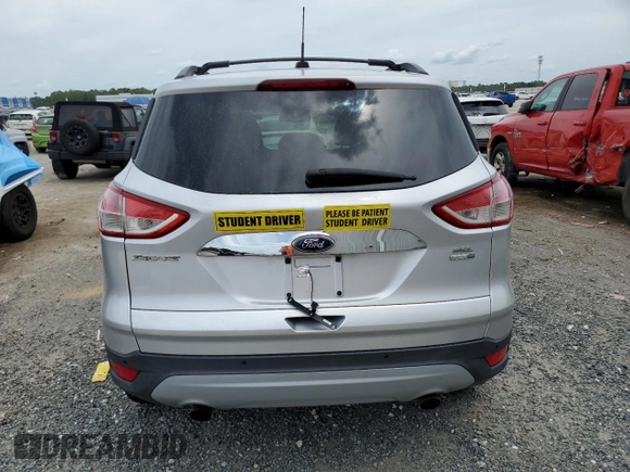 2013 Ford Escape SEL с VIN 1FMCU9H90DUD66849, выставлен на аукционе Copart как лот 58592015 с пробегом 134 998 миль миль и На запчасти • Non repairable. История ставок и продаж доступна на DreamBid. Изображение 6.