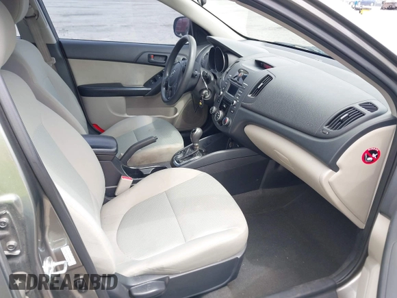 2012 Kia Forte EX with VIN KNAFU4A2XC5560585, listed as a IAAI auction lot 42121133 with 151,079 mi miles. Bid and sale history available at carsss.com. Image 5.